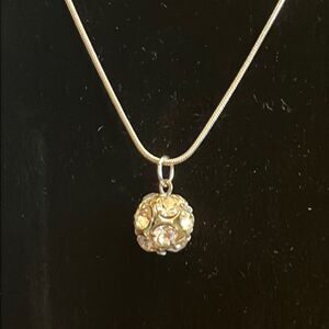 Handcrafted silver tone 18 inch necklace and pendant with clear stones.